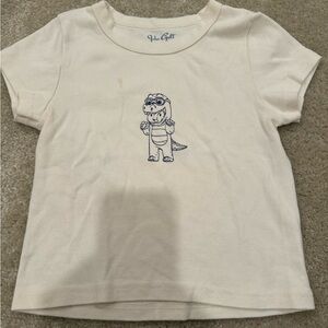 Brandy Melville Cream Tee with Dinosaur Graphic